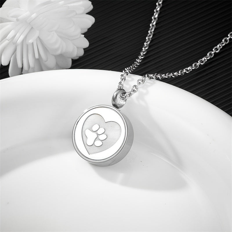Collier avec urne funéraire pour cendres d'animaux, en acier inoxydable en forme de cœur avec empreinte de patte, diverses couleurs